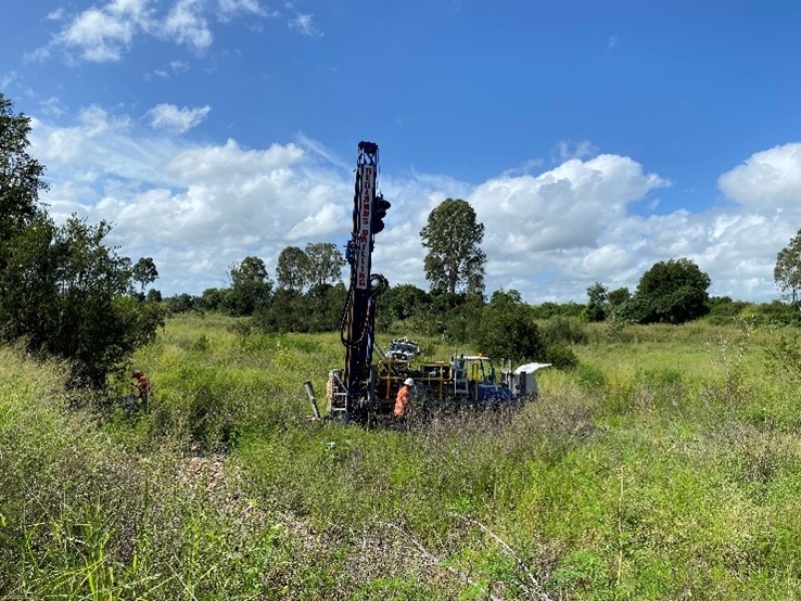 Gully eroded by the floods, Mark Waud walking in it